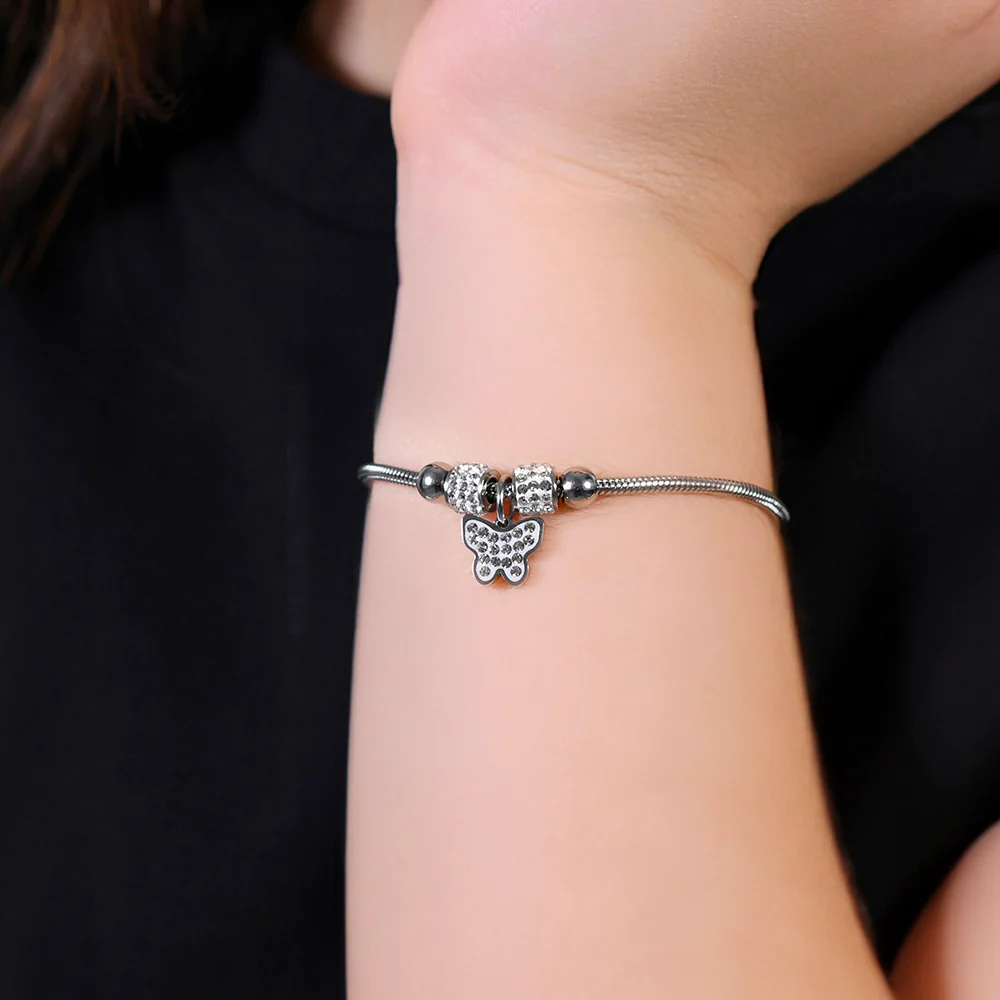BRACCIALE BAMBINA IN ACCIAIO CON FARFALLA CON CRISTALLI BIANCHI - Image 2