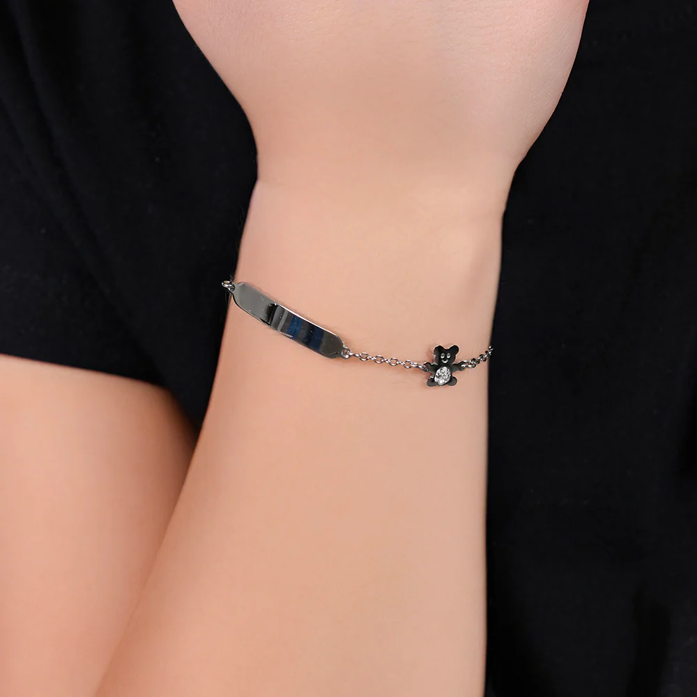 BRACCIALE BAMBINA IN ACCIAIO CON PIASTRA ED ORSETTO CON CRISTALLI BIANCHI - Image 2