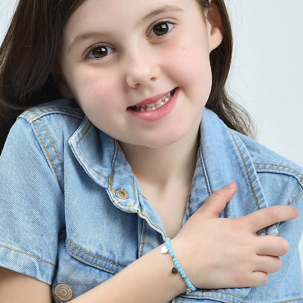 BRACCIALE BAMBINA IN ACCIAIO CON PIETRE TURCHESI E CUORI - Image 3