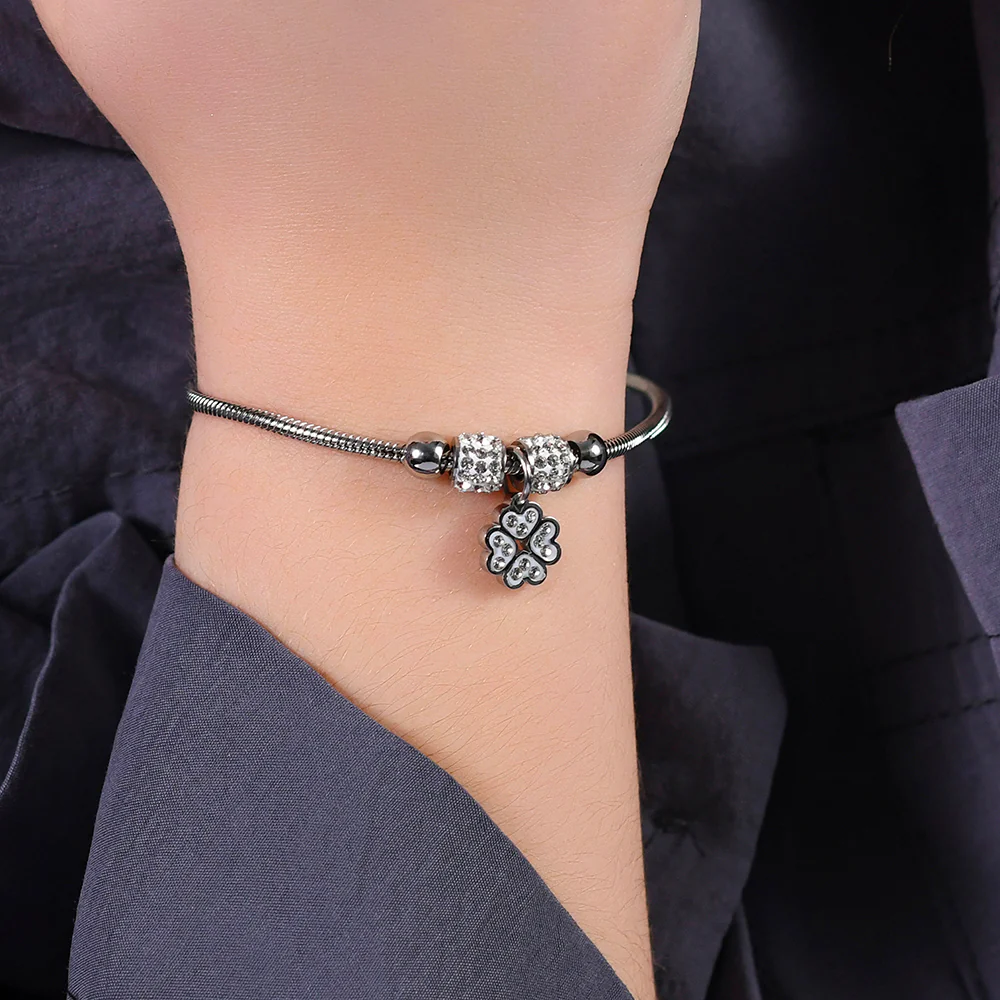 BRACCIALE BAMBINA IN ACCIAIO CON QUADRIFOGLIO CON CRISTALLI BIANCHI - Image 2