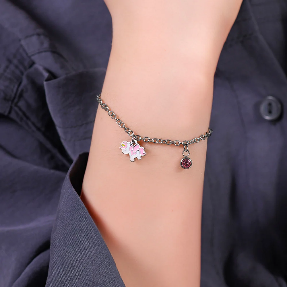 BRACCIALE BAMBINA IN ACCIAIO CON UNICORNO CON SMALTO ROSA E BIANCO E CRISTALLO - Image 2