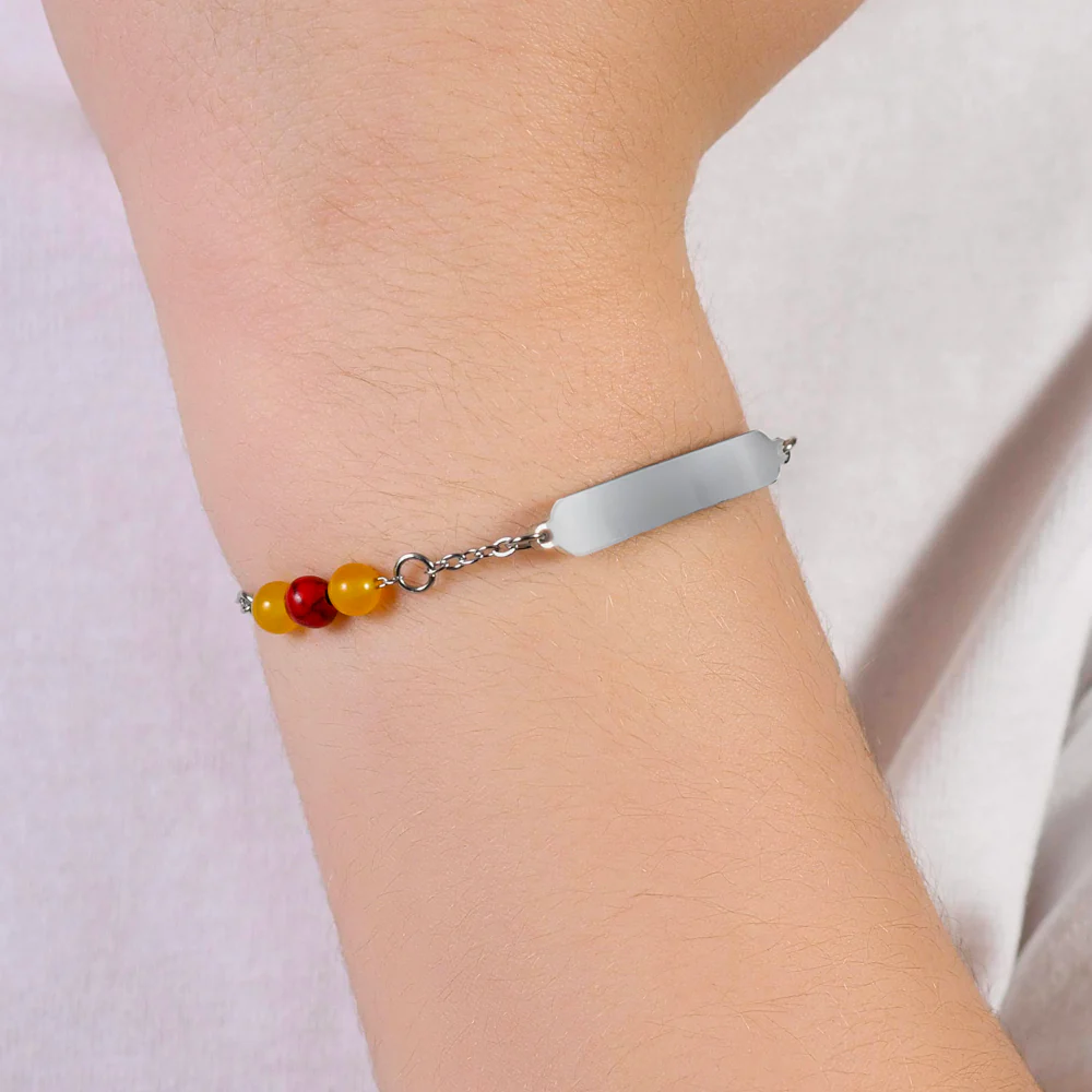 BRACCIALE BAMBINO IN ACCIAIO CON PIETRE GIALLE E ROSSE - Image 2