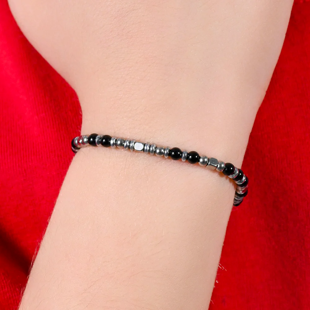 BRACCIALE BAMBINO IN ACCIAIO CON PIETRE NERE E GRIGIE - Image 2
