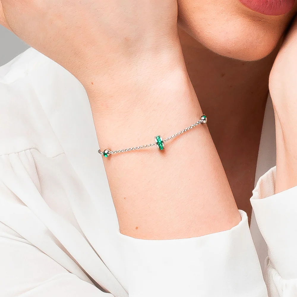 BRACCIALE DONNA IN ACCIAIO, BUSSOLOTTO ED ELEMENTI CON ZIRCONI VERDI - Image 2