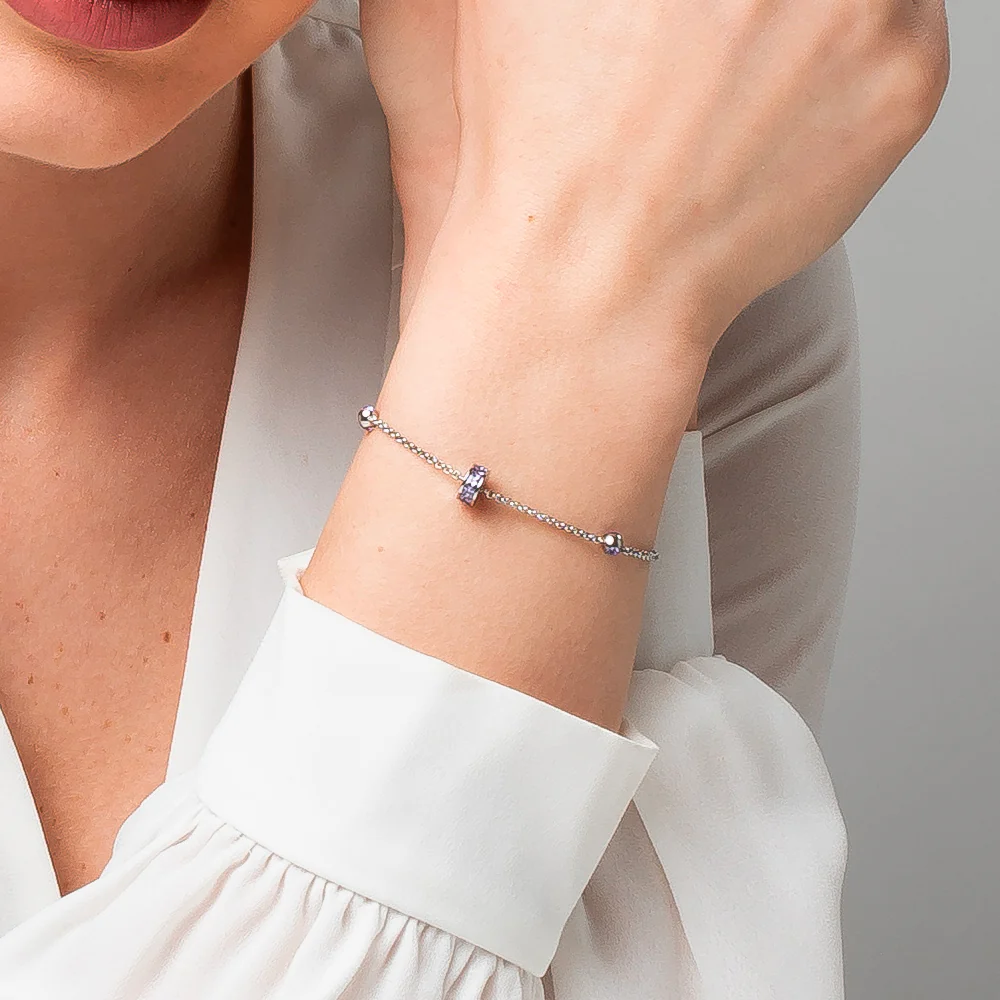 BRACCIALE DONNA IN ACCIAIO, BUSSOLOTTO ED ELEMENTI CON ZIRCONI VIOLA - Image 2