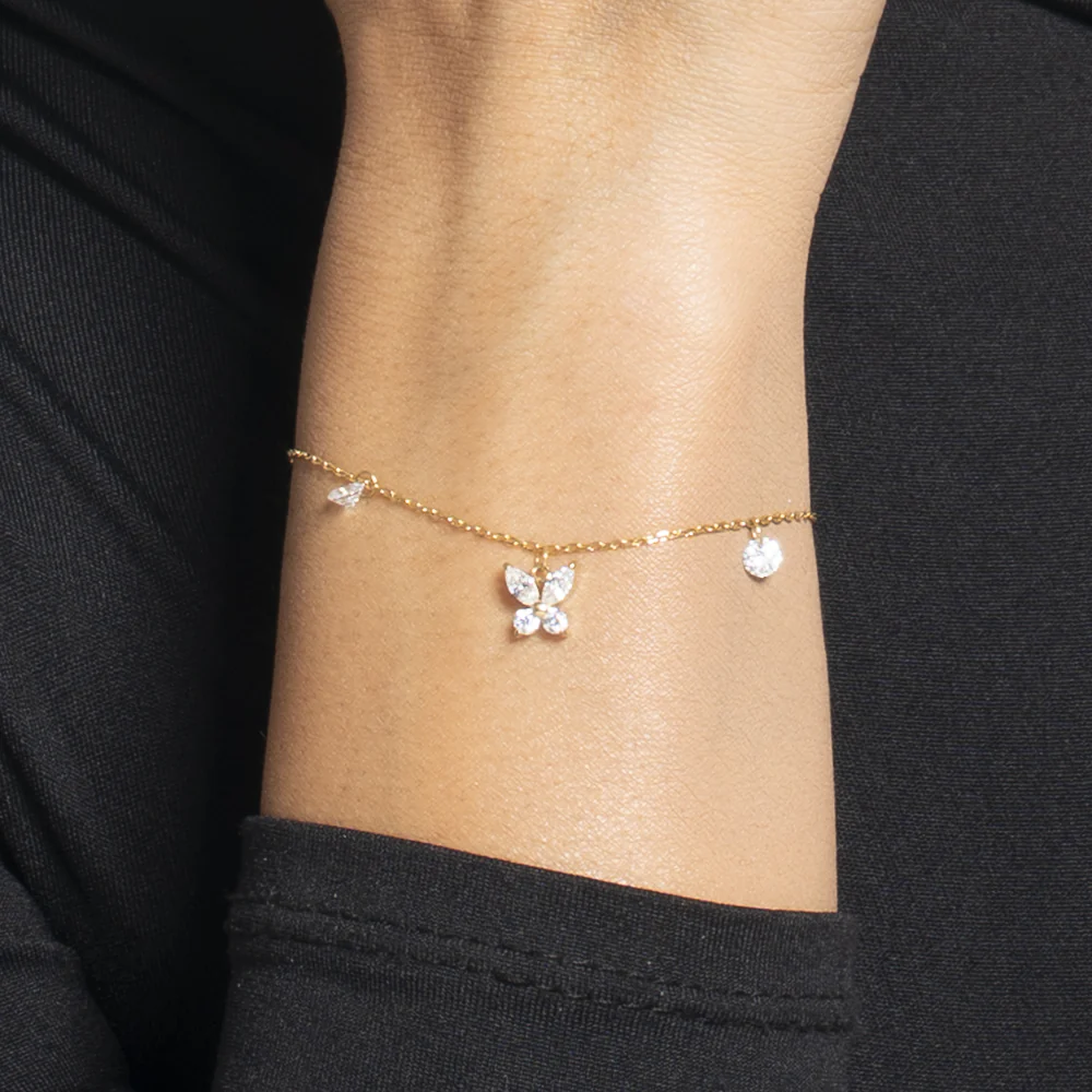 BRACCIALE DONNA IN ACCIAIO COLORE ORO CON PENDENTE FARFALLA ED ALI ZIRCONE BIANC - Image 2