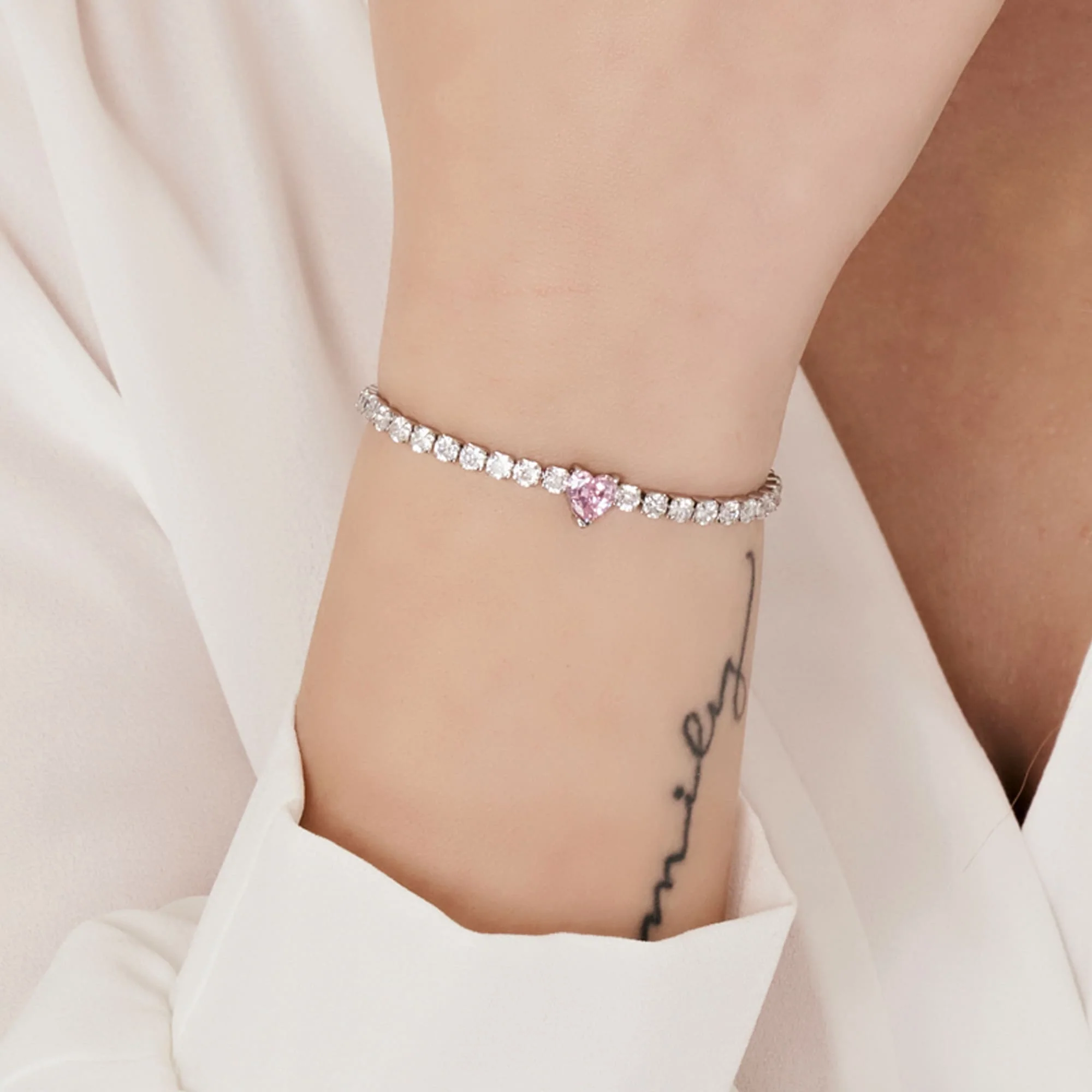 BRACCIALE DONNA IN ACCIAIO CON CRISTALLI BIANCHI E CUORE CRISTALLO ROSA - Image 2