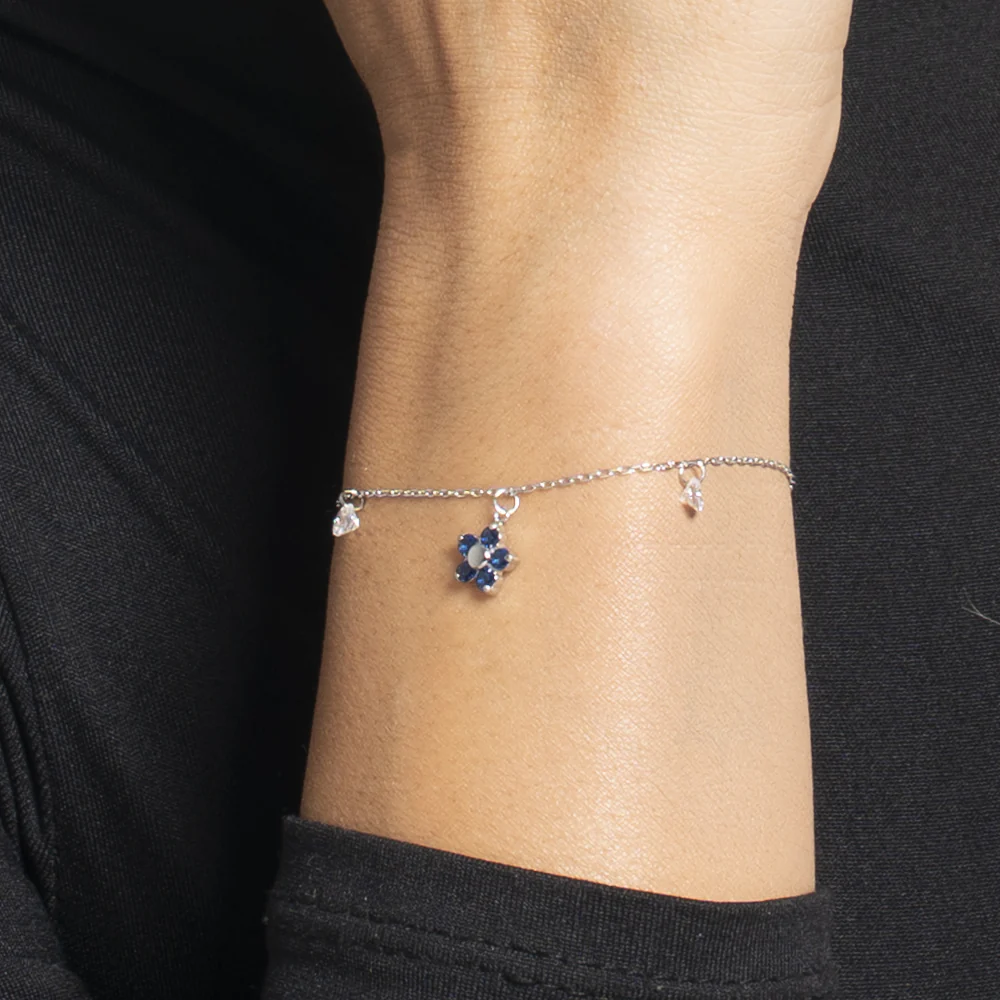 BRACCIALE DONNA IN ACCIAIO CON PENDENTE FIORE E PETALI ZIRCONE BLU - Image 2