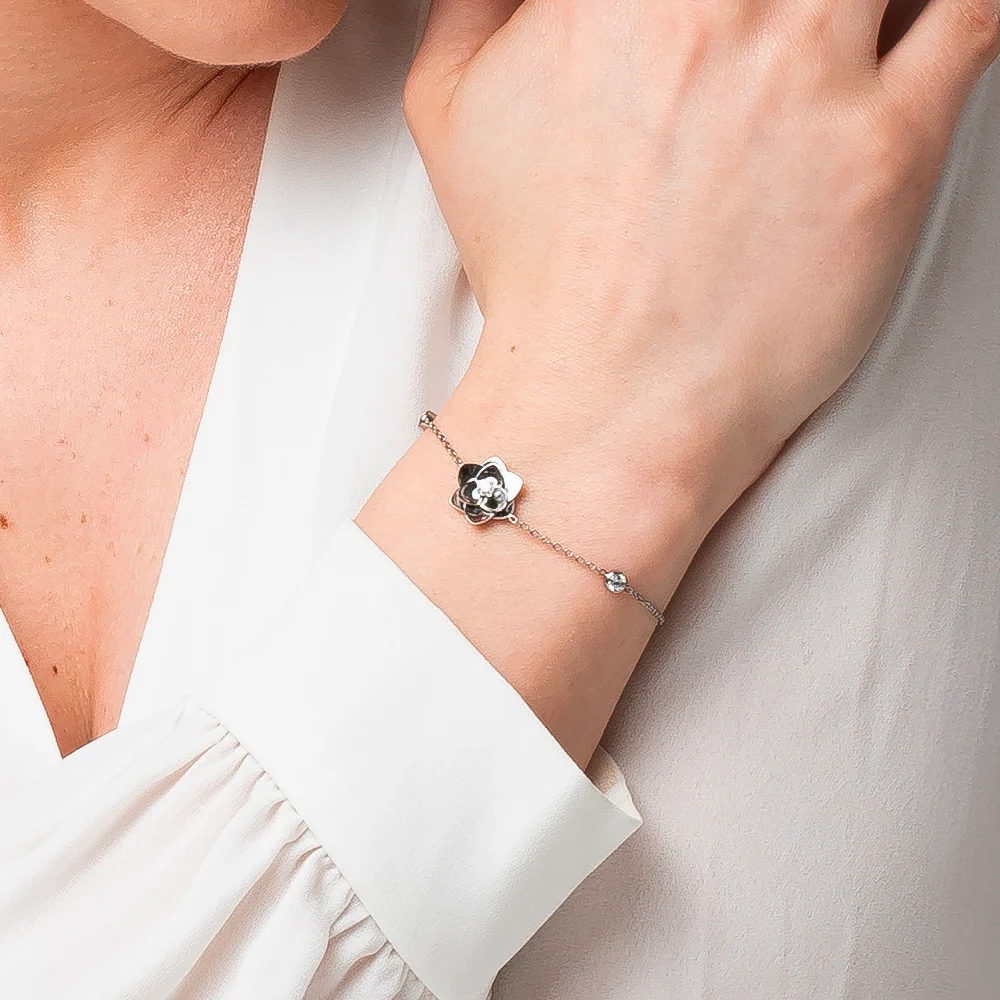 BRACCIALE DONNA IN ACCIAIO, FIORE ED ELEMENTI CON ZIRCONI BIANCHI - Image 2