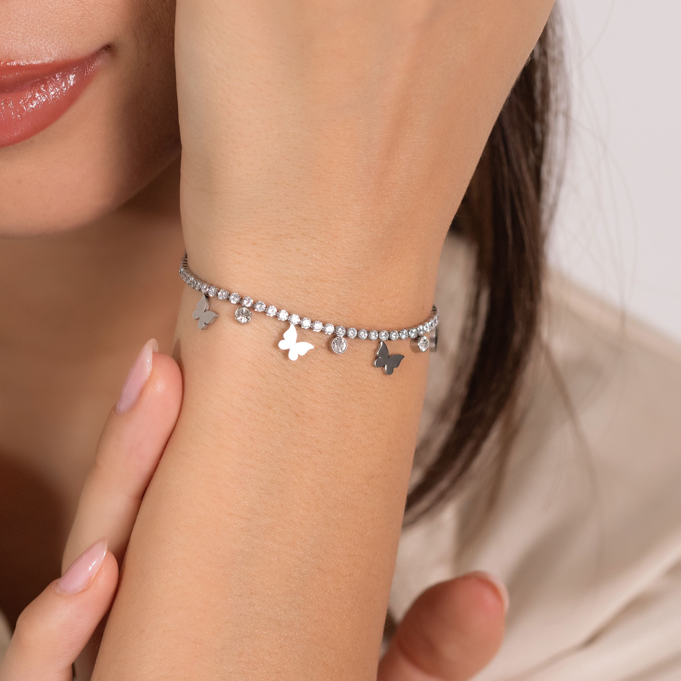BRACCIALE TENNIS DONNA IN ACCIAIO CON CRISTALLI BIANCHI E FARFALLE - Image 2
