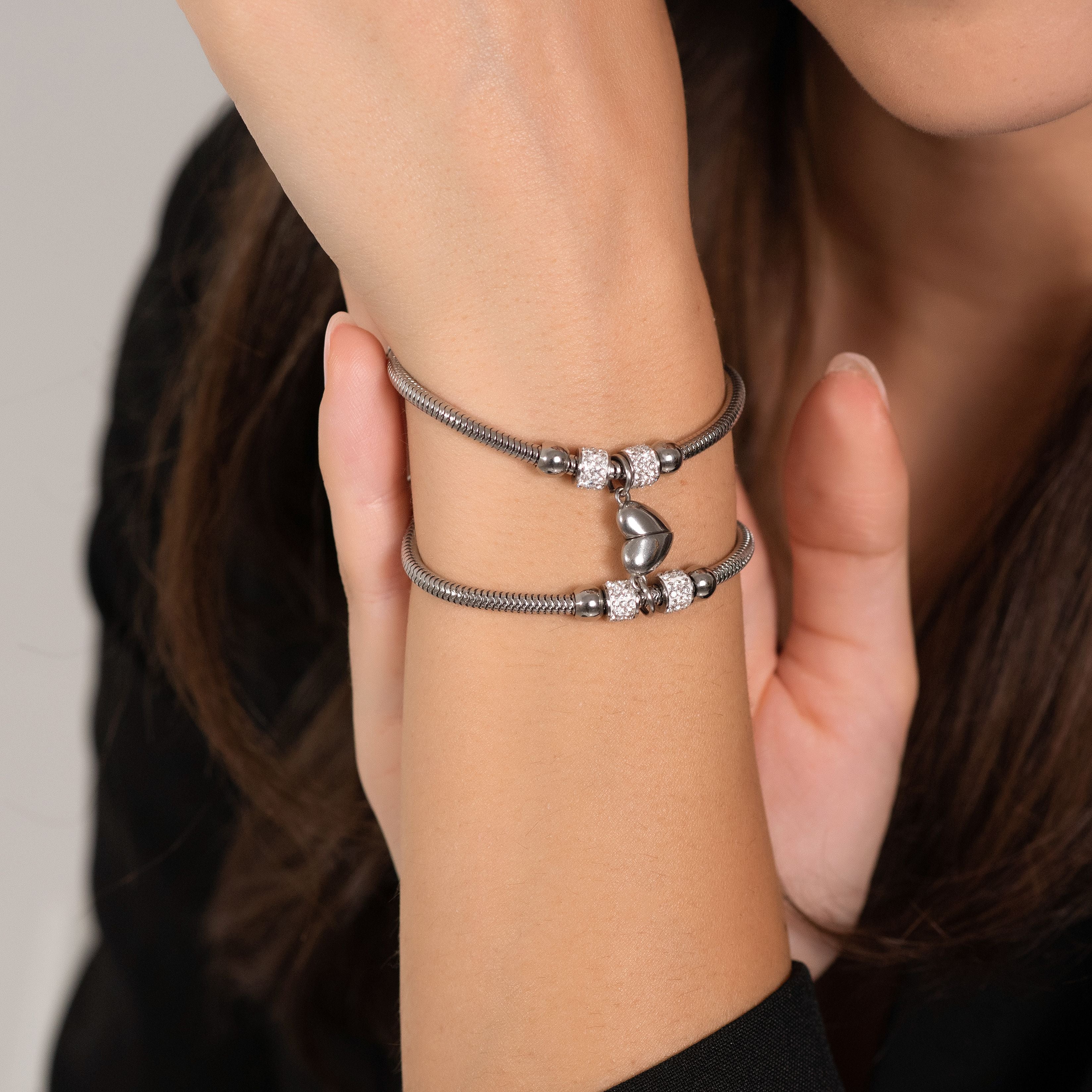 BRACCIALI DONNA IN ACCIAIO CON MEZZO CUORE CALAMITATO - Image 4