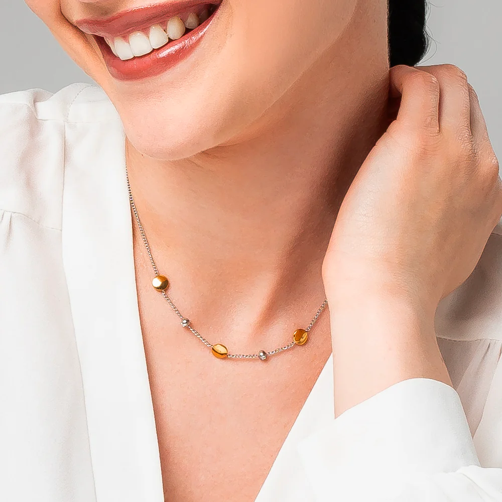 COLLANA DONNA IN ACCIAIO CON ELEMENTI IN ACCIAIO IP GOLD E CRISTALLI BIANCHI - Image 2